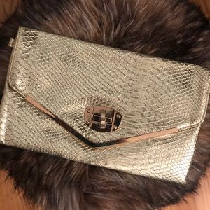 Pre-loved champagne gold croc-print clutch